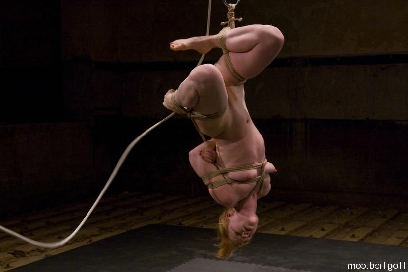 15P Busty babe gets tied up with rope