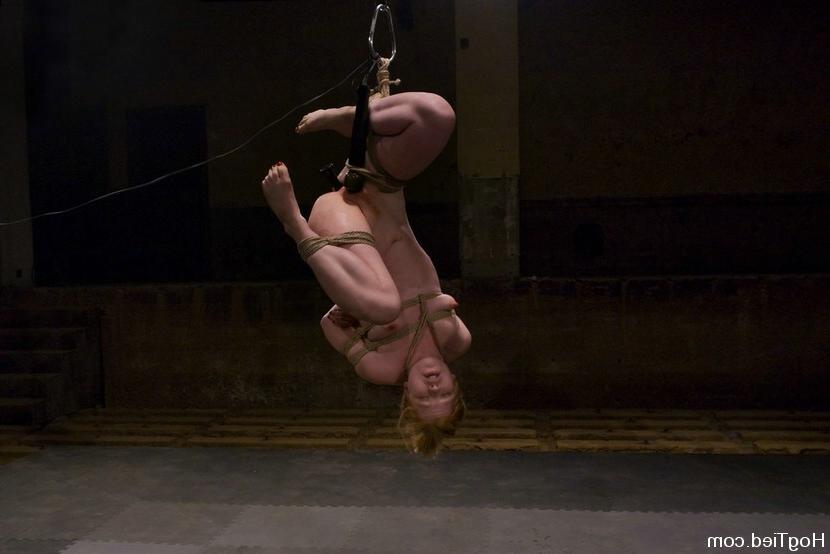 15P Busty babe gets tied up with rope