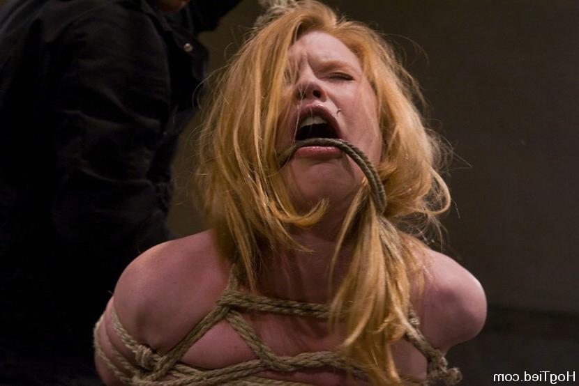 15P Busty babe gets tied up with rope
