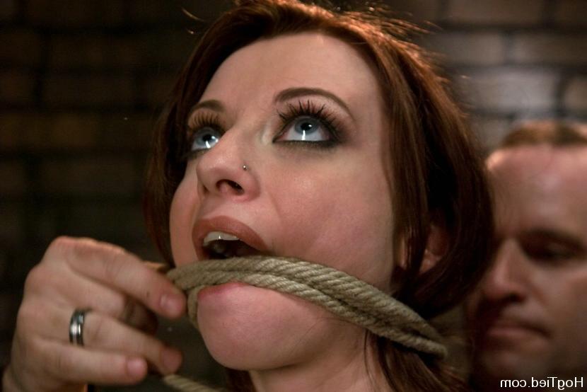 15P Busty babe gets tied up with rope