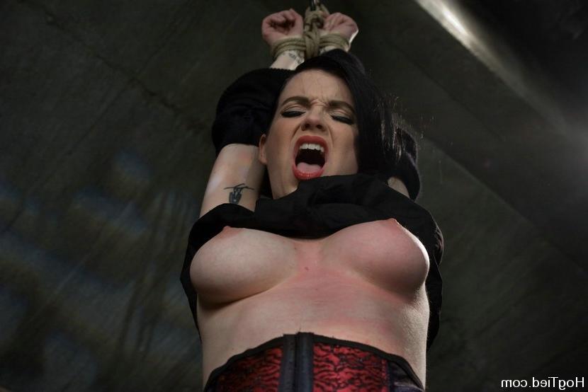 15P Busty babe gets tied up with rope