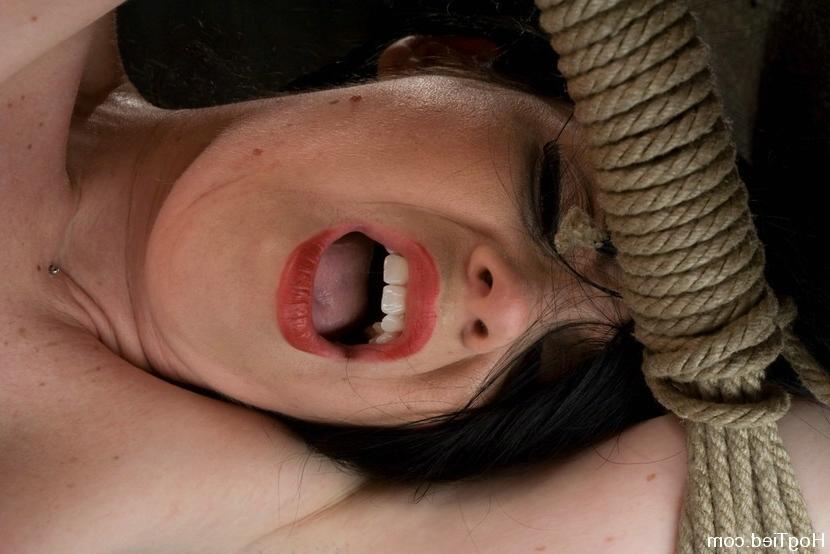 15P Busty babe gets tied up with rope