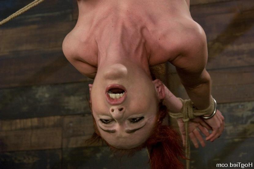 15P Busty babe gets tied up with rope