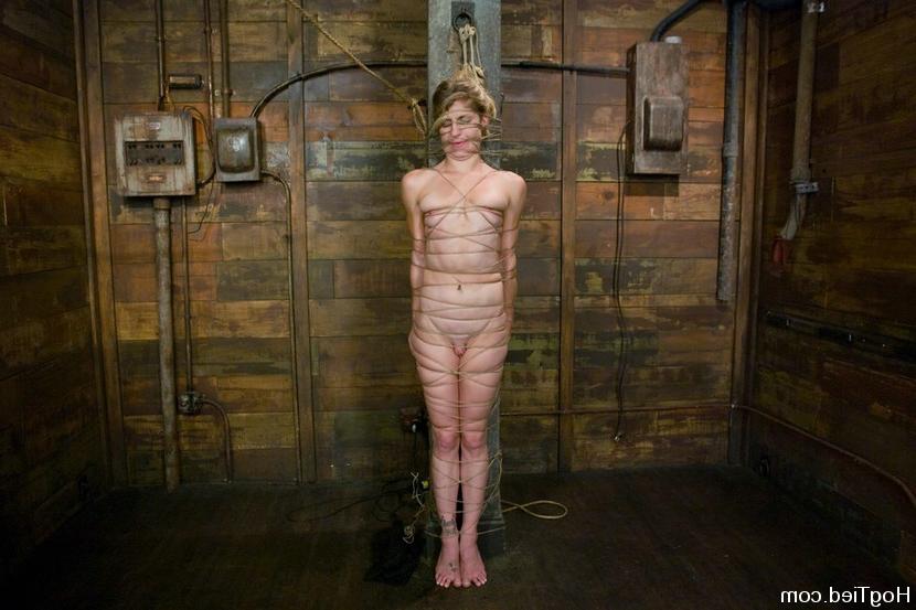 15P Busty babe gets tied up with rope