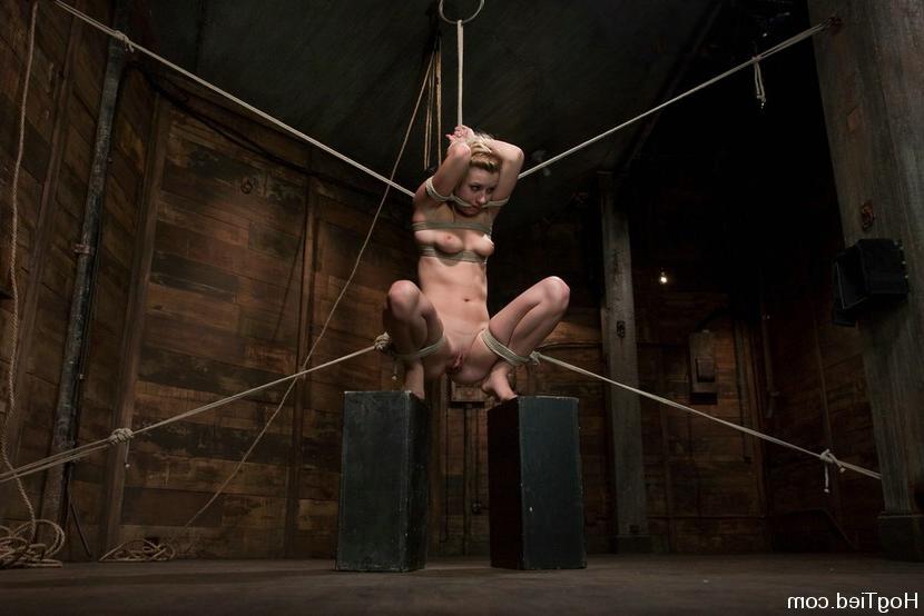 15P Busty babe gets tied up with rope