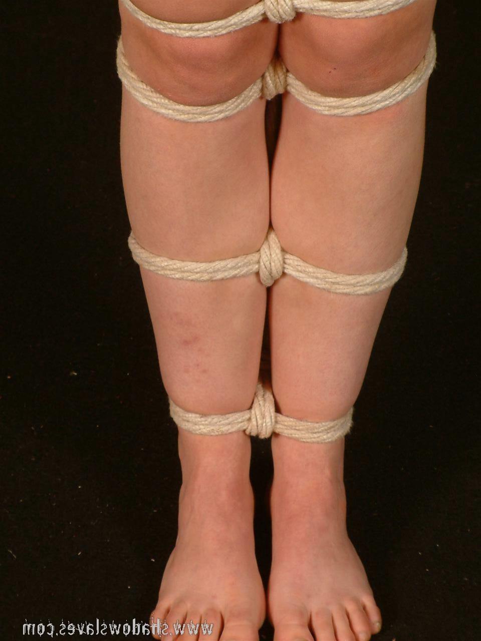 15P Cool blonde slave girl posing in very tight rope bondage