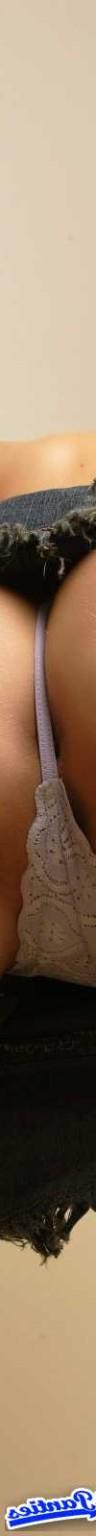 18P Ashlee wearing a white lace g string and a jean mini skirt and some great up ski