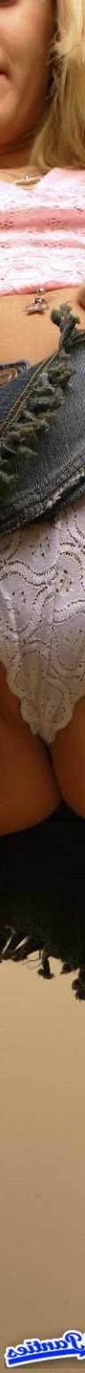18P Ashlee wearing a white lace g string and a jean mini skirt and some great up ski