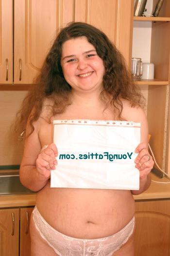 16P Cute plump teen posing naked in the kitchen