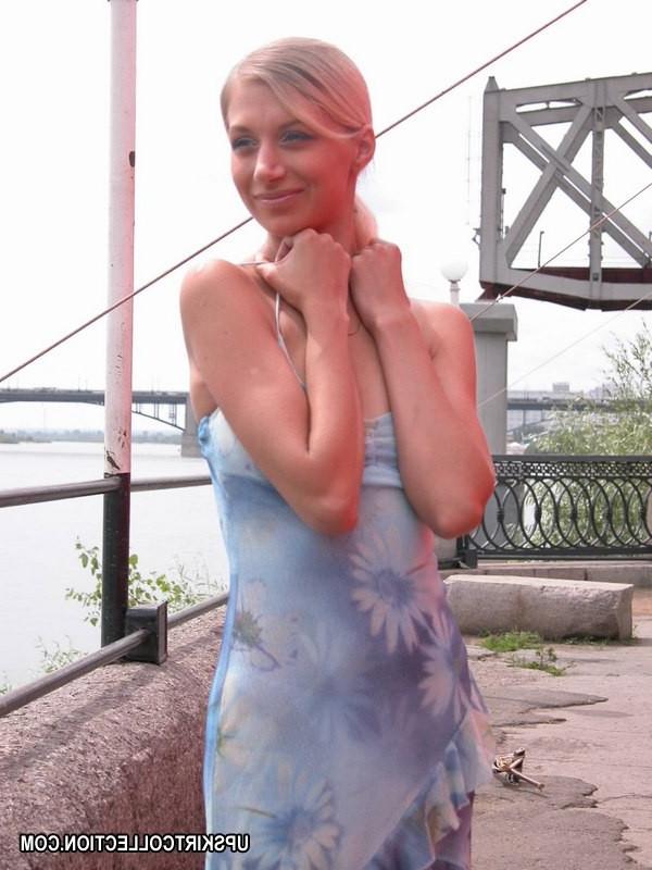 15P Incredible blonde's upskirt shot in insane photo session