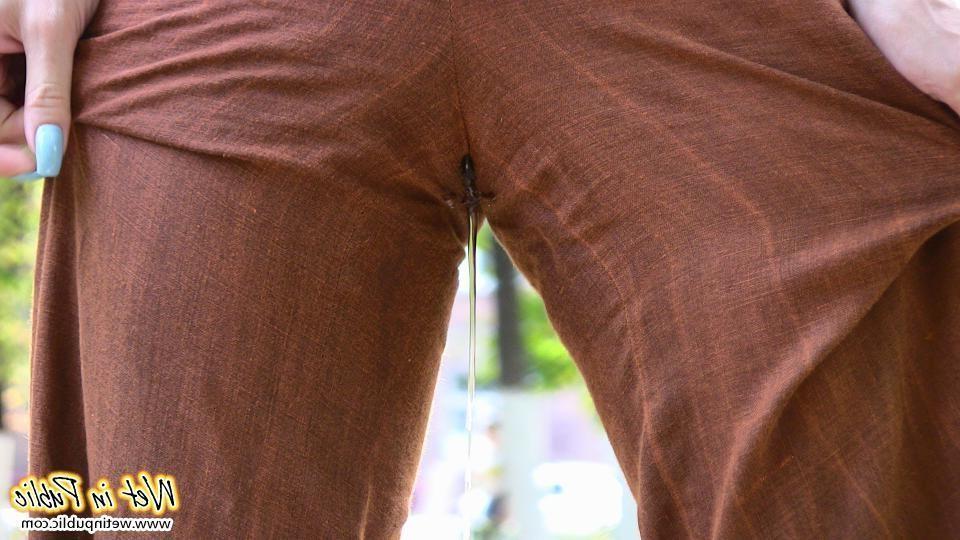 16P Blonde addicted to public pissing makes her pants all wet in a park