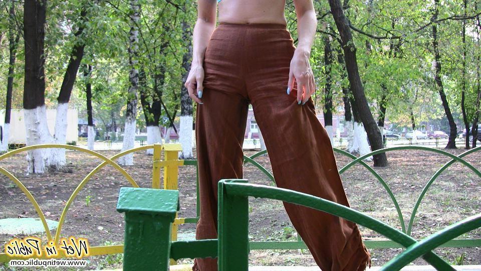 16P Blonde addicted to public pissing makes her pants all wet in a park