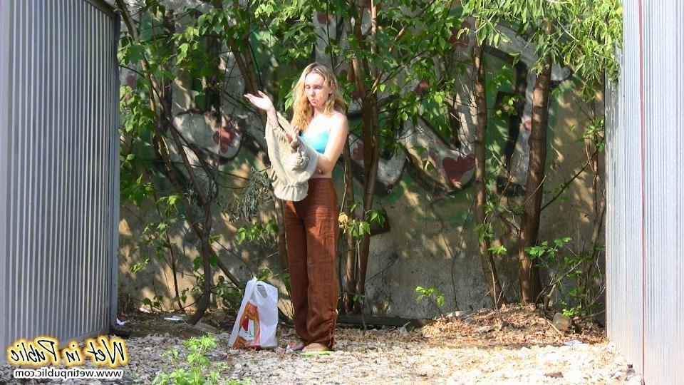 16P Blonde addicted to public pissing makes her pants all wet in a park
