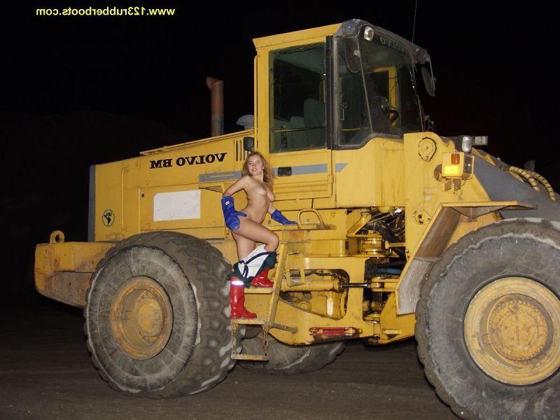 20P Hot babe outdoors in rubber boots and rainwear