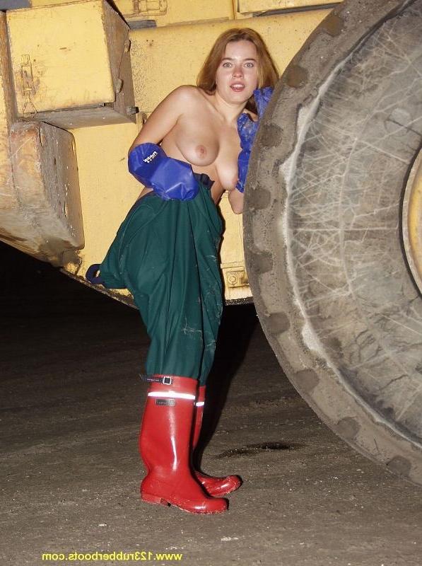 20P Hot babe outdoors in rubber boots and rainwear