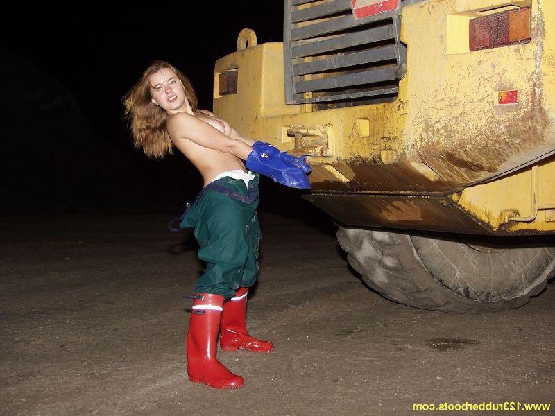 20P Hot babe outdoors in rubber boots and rainwear