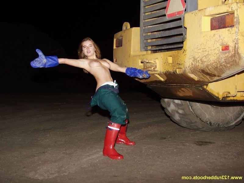 20P Hot babe outdoors in rubber boots and rainwear