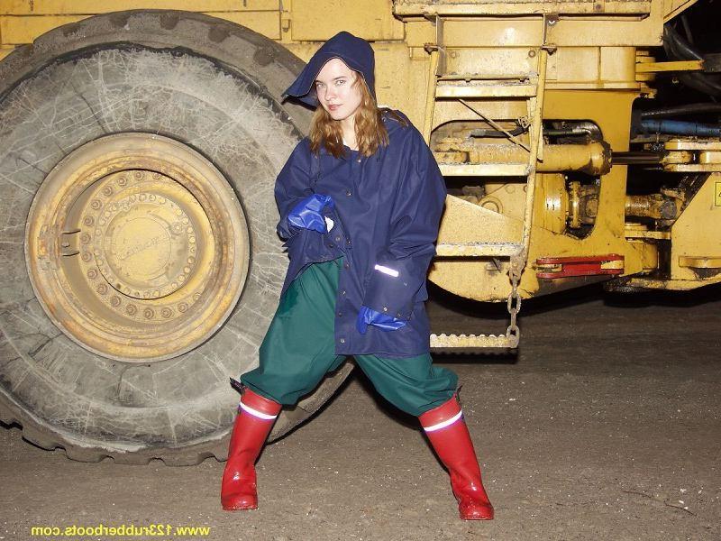 20P Hot babe outdoors in rubber boots and rainwear