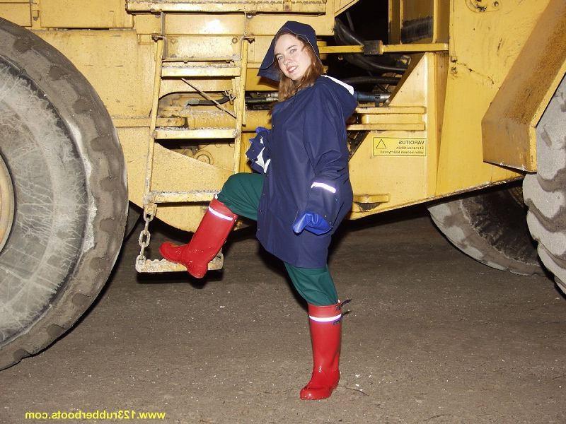 20P Hot babe outdoors in rubber boots and rainwear