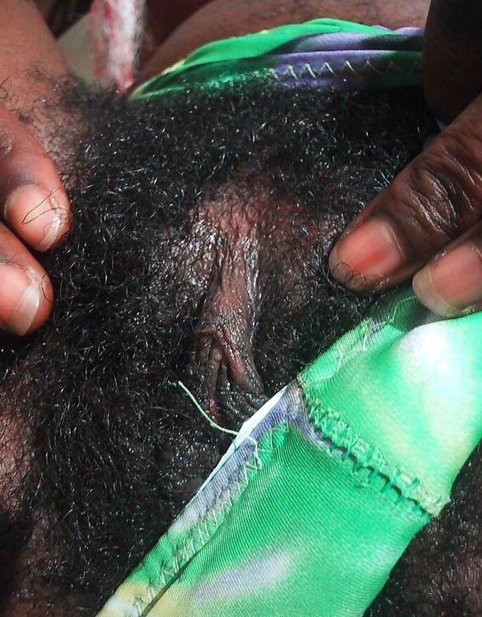 16P Skinny ebony babe with very hairy pussy