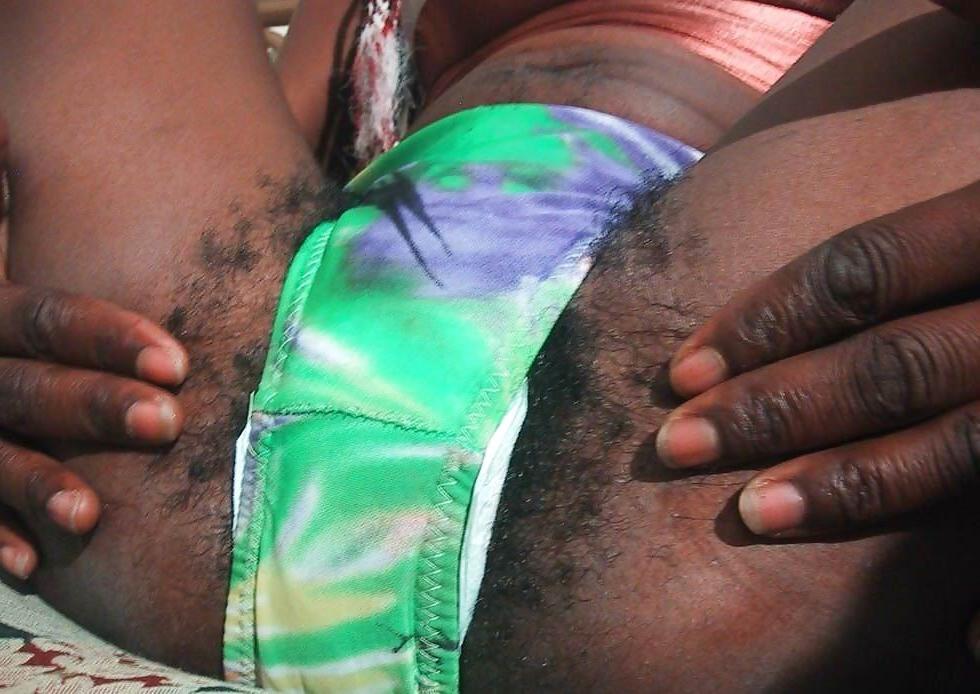 16P Skinny ebony babe with very hairy pussy