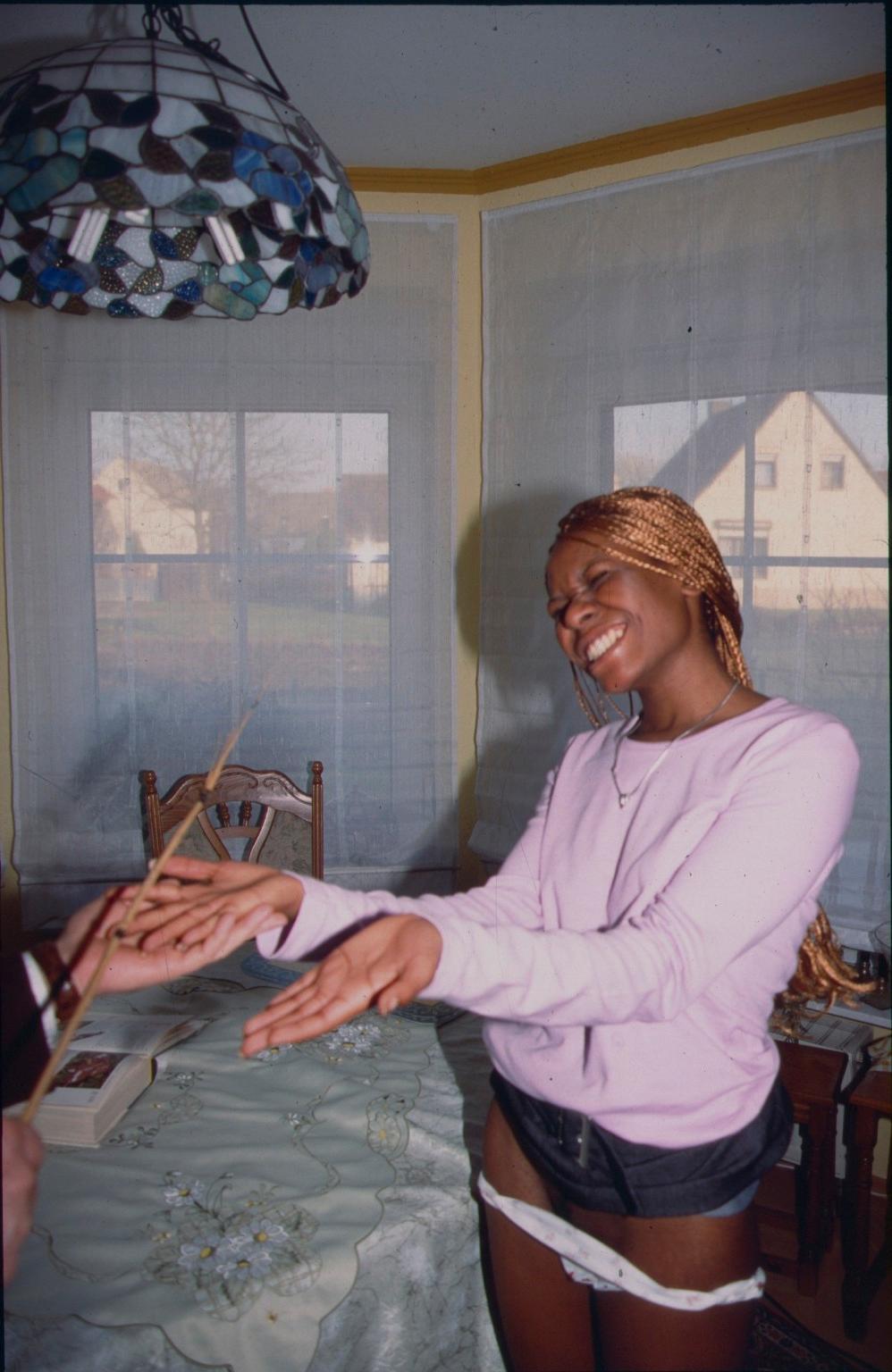 15P Black girl caning and palm spanking of ebony slaveslut