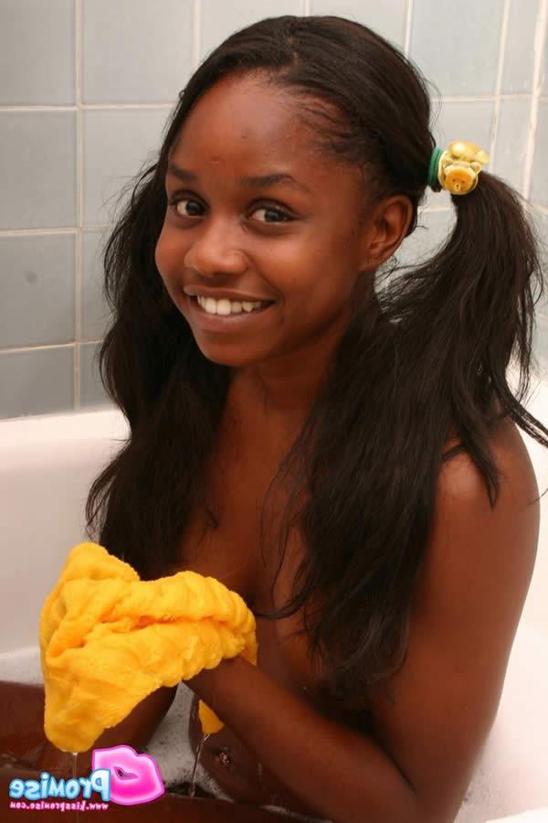 15P Cute ebony teen getting soapy in the shower