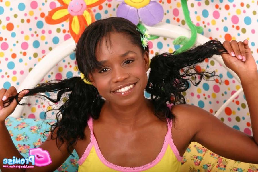 16P Cute ebony teen wakes up and strips on the bed