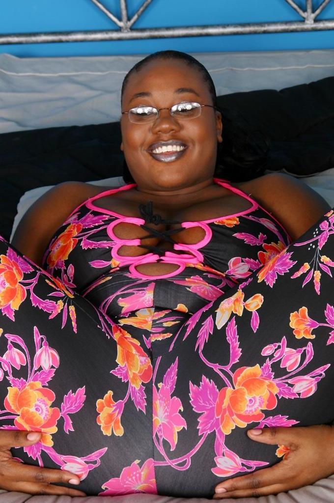 20P Huge tit ebony loves strip teasing and spreading her pussy