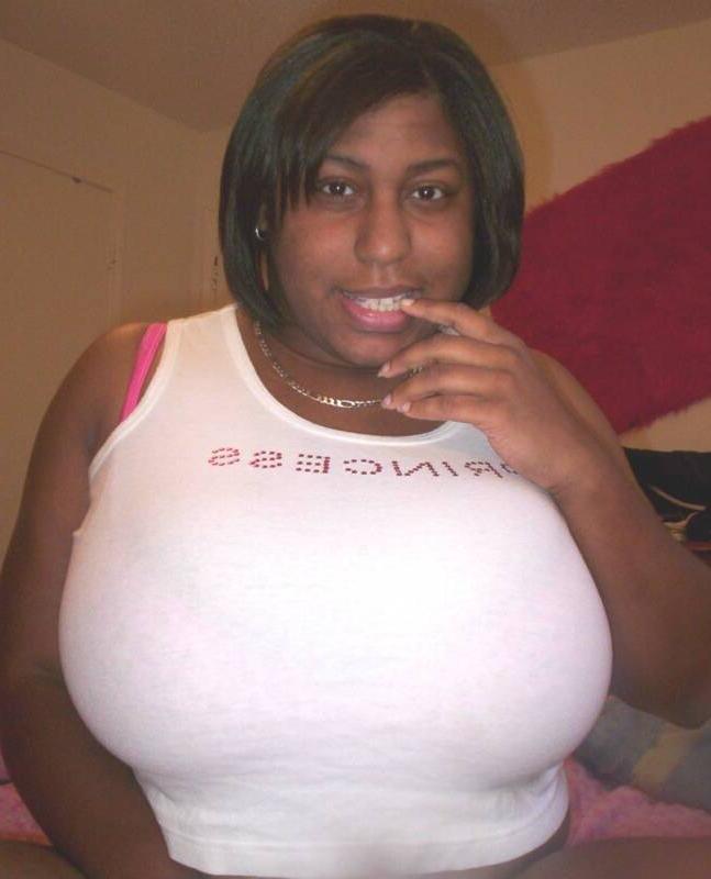 12P Curvy amateur showing big black tits on webcam