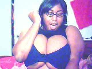 12P Curvy amateur showing big black tits on webcam