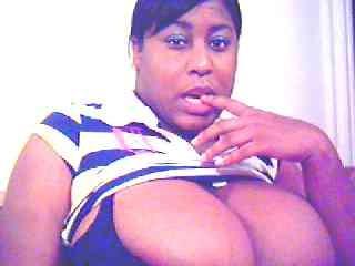 12P Curvy amateur showing big black tits on webcam