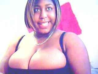 12P Curvy amateur showing big black tits on webcam