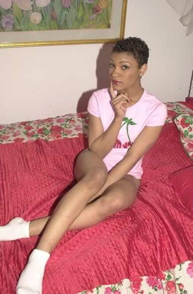 16P Ebony chick undressing and spreading in bed
