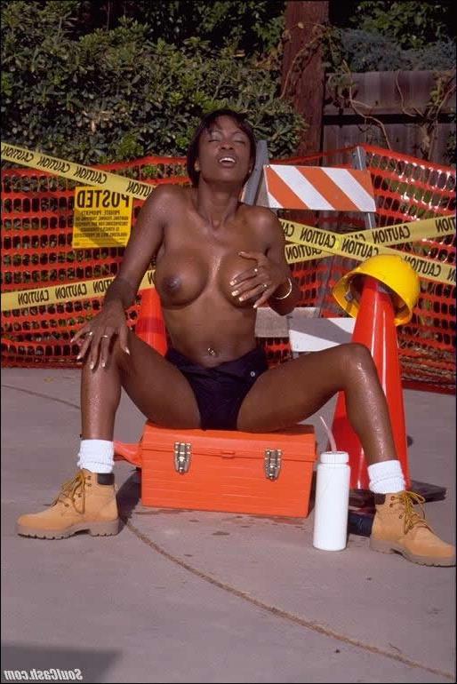 15P Busty black girl toying outside on the street