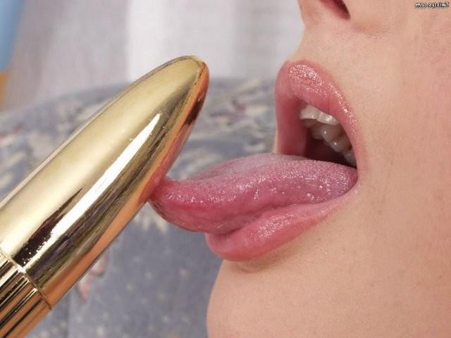 16P Sandra Shine playing with vibrator in a chair