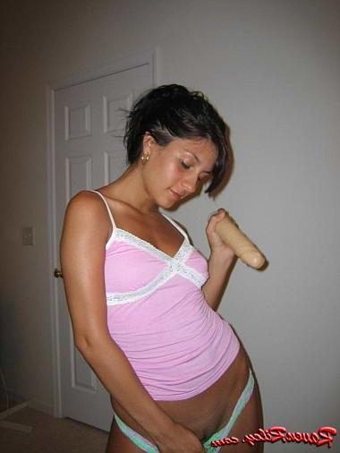 20P Brunette rubbing crotch against dildo