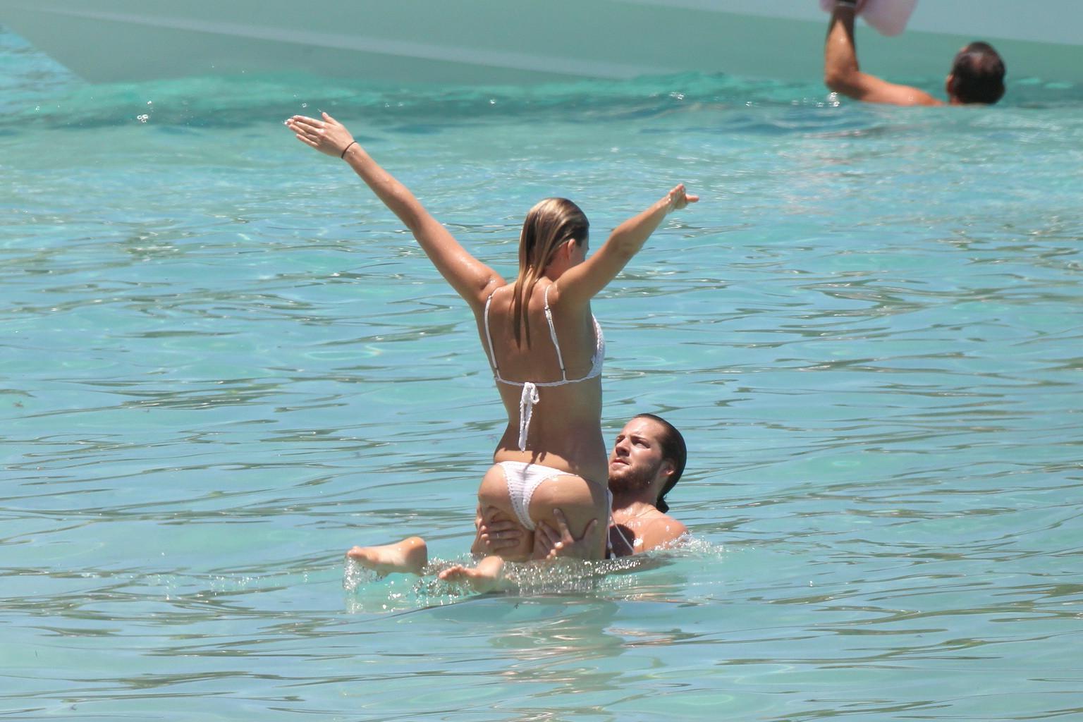 16P Margot Robbie getting ass groping in tiny white bikini