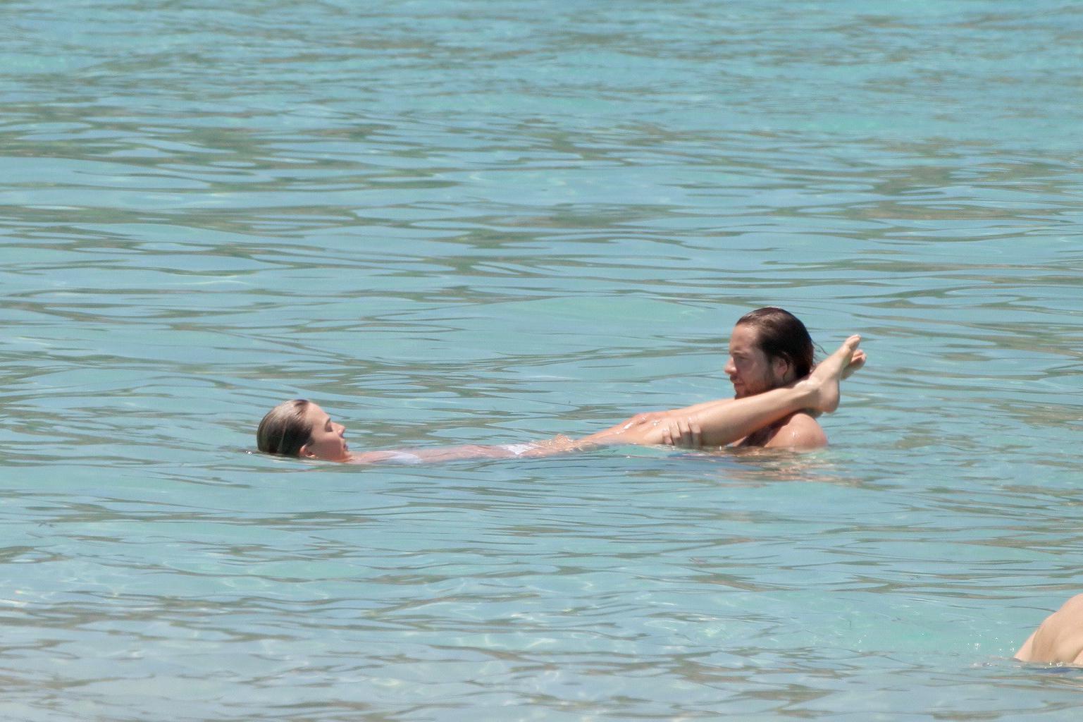 16P Margot Robbie getting ass groping in tiny white bikini
