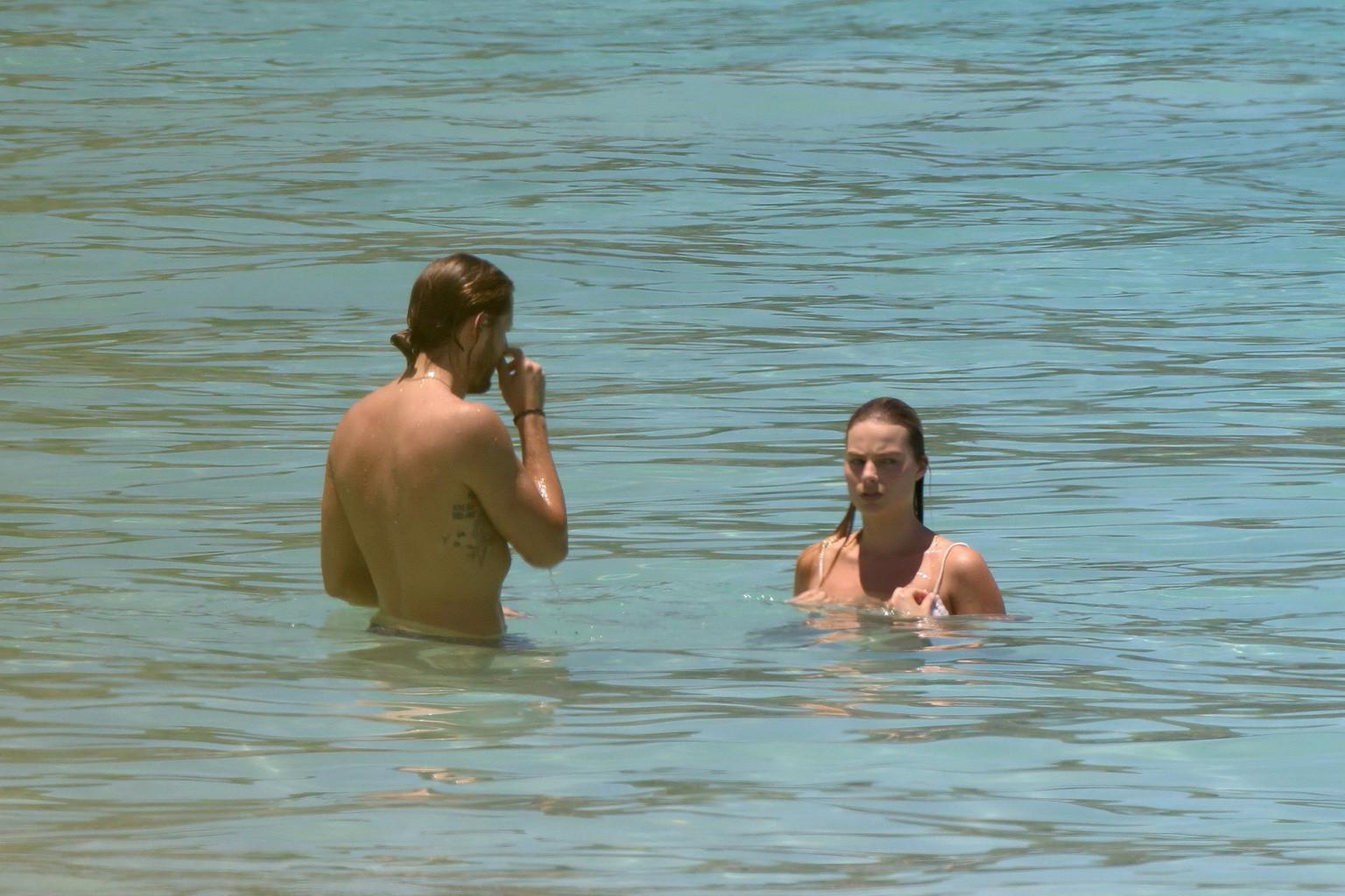16P Margot Robbie getting ass groping in tiny white bikini