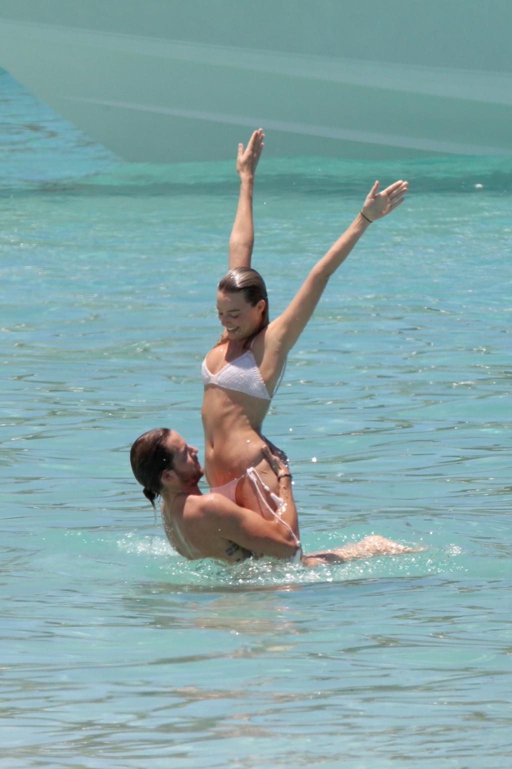 16P Margot Robbie getting ass groping in tiny white bikini