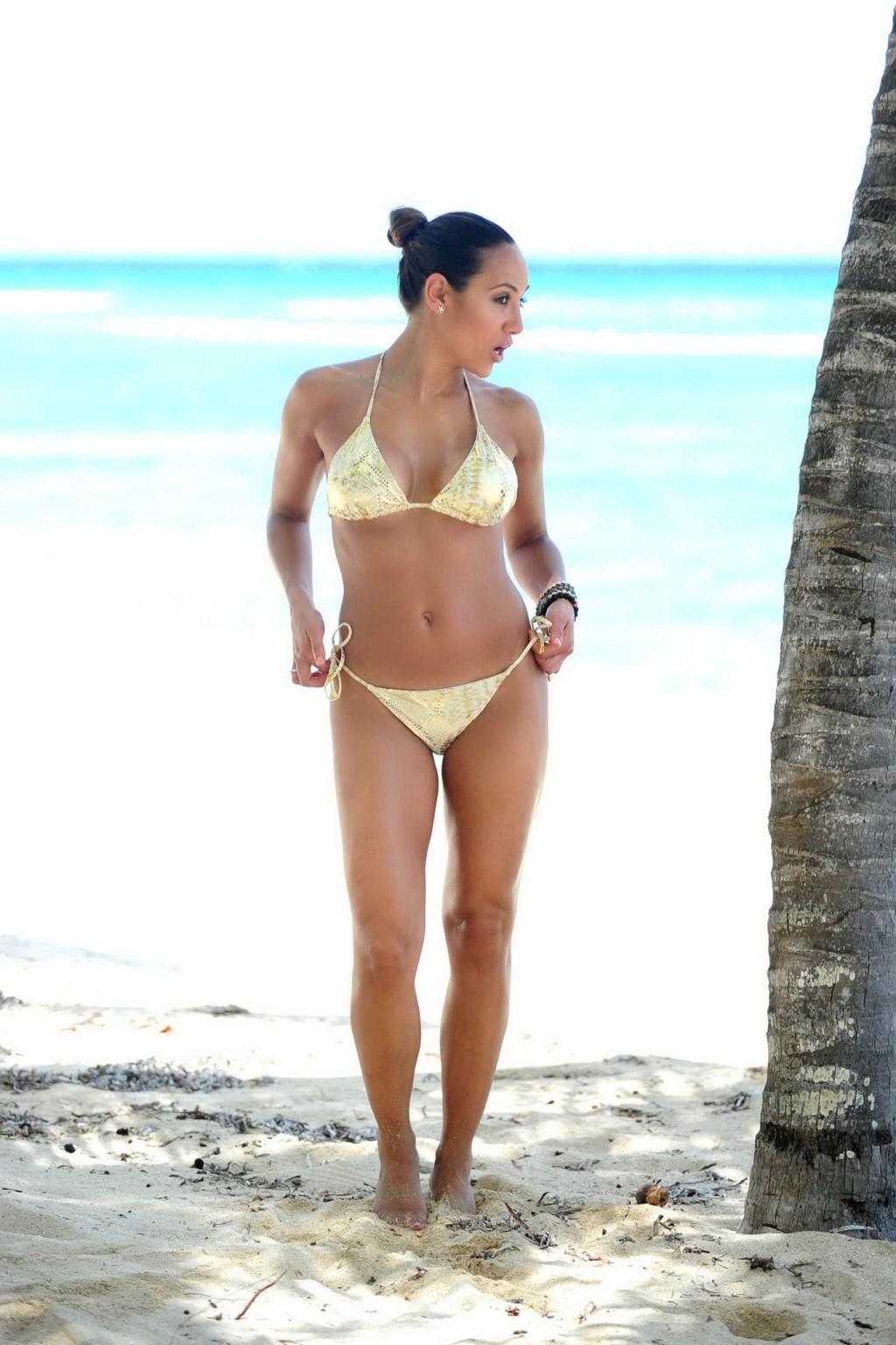 16P Melissa Gorga busty in skimpy golden string bikini at the vacation in Jamaica
