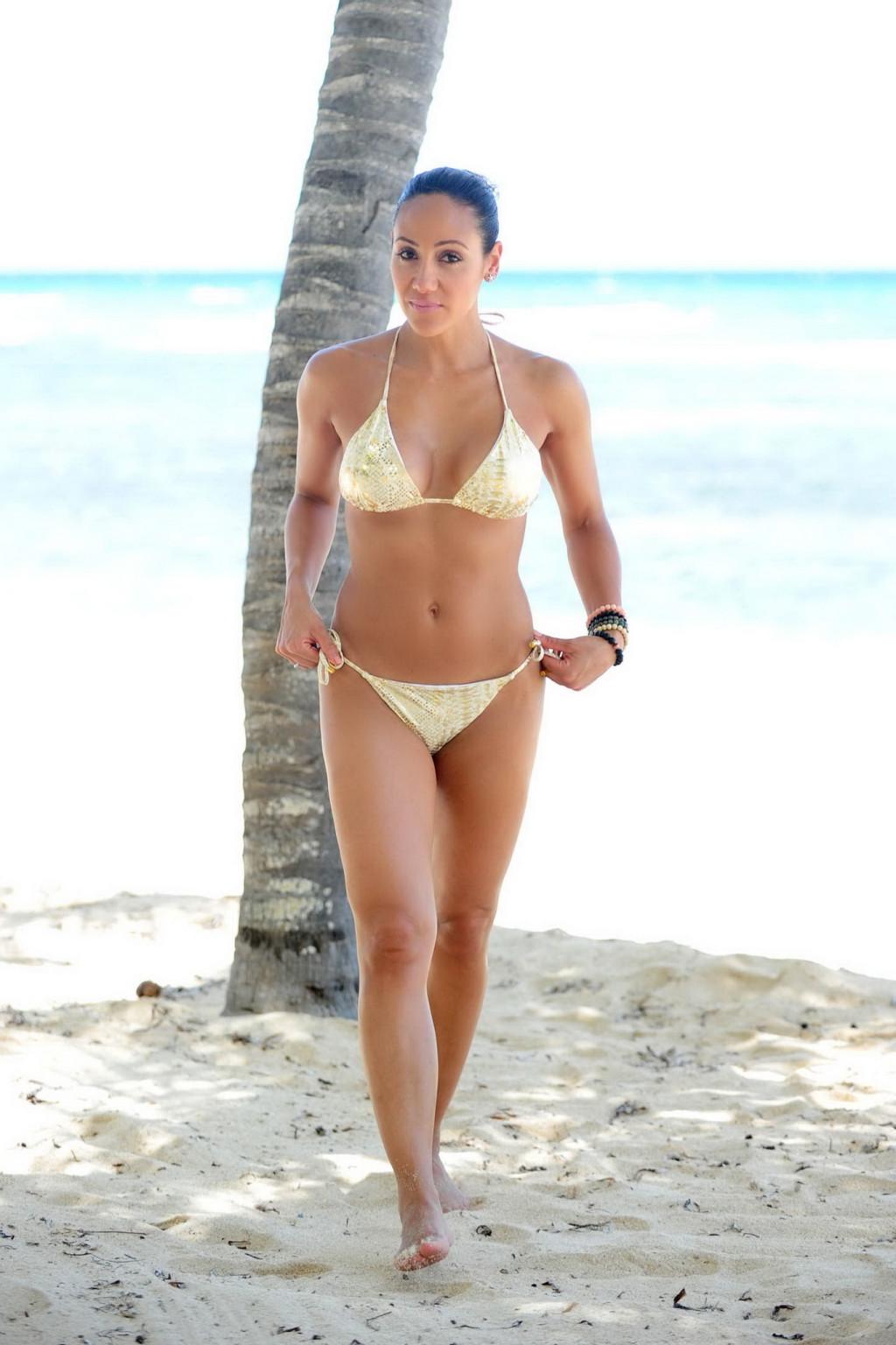 16P Melissa Gorga busty in skimpy golden string bikini at the vacation in Jamaica