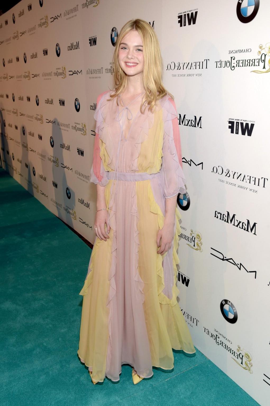 16P Elle Fanning braless wearing a sexy dress at the 8th Annual Women in Film PreOsc