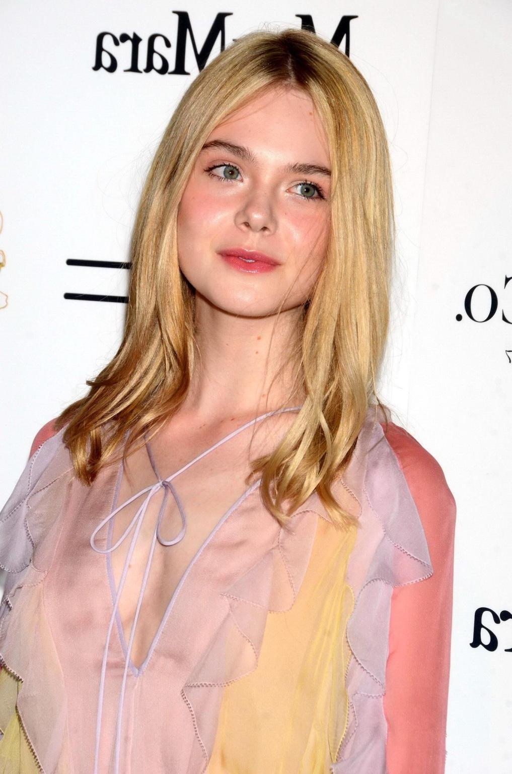 16P Elle Fanning braless wearing a sexy dress at the 8th Annual Women in Film PreOsc