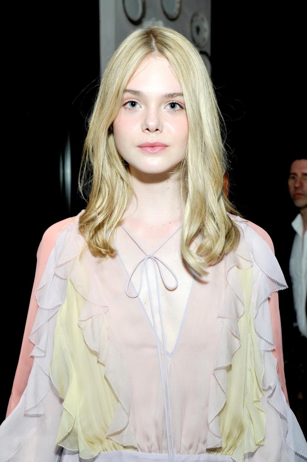 16P Elle Fanning braless wearing a sexy dress at the 8th Annual Women in Film PreOsc
