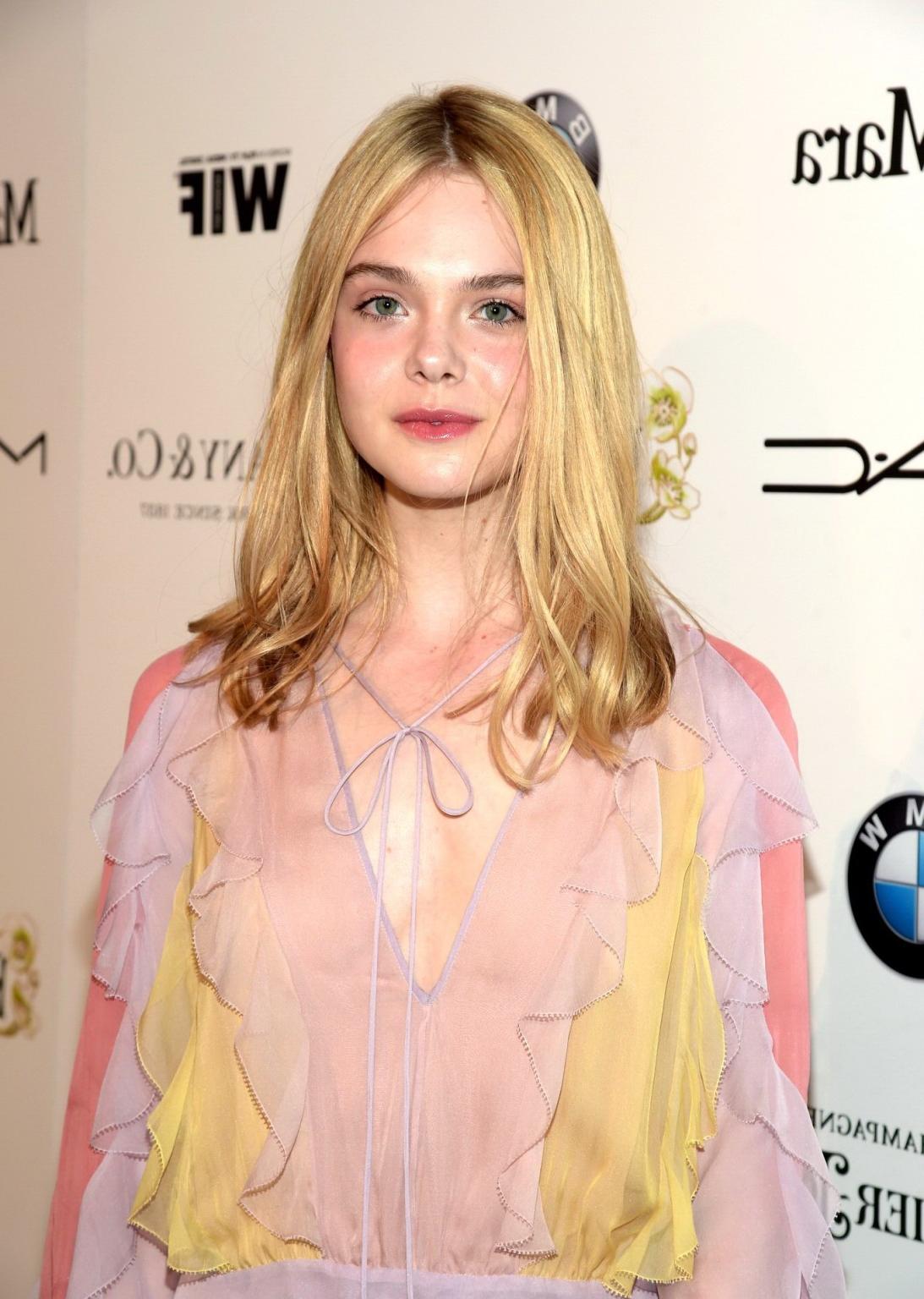 16P Elle Fanning braless wearing a sexy dress at the 8th Annual Women in Film PreOsc