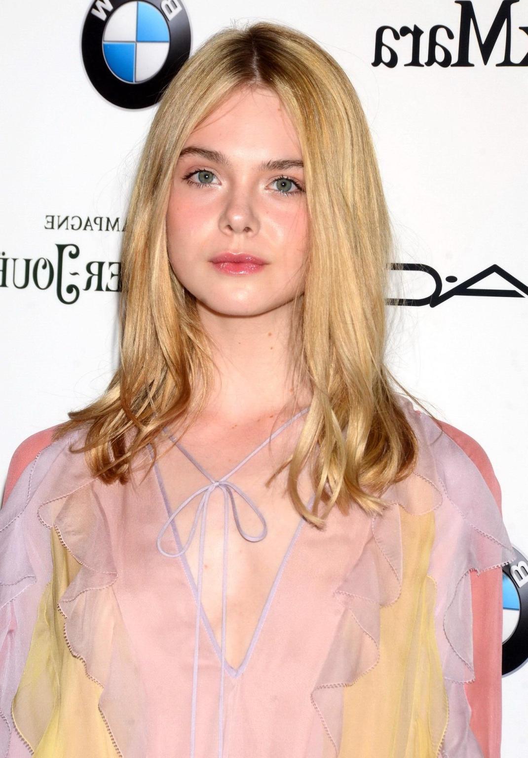 16P Elle Fanning braless wearing a sexy dress at the 8th Annual Women in Film PreOsc