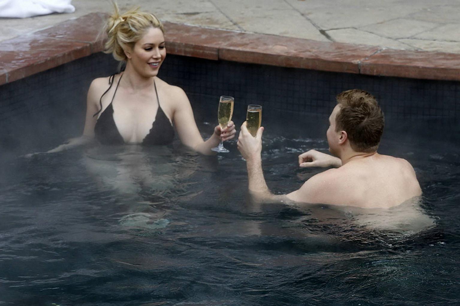 16P Heidi Montag busty in tiny black bikini in a hot spa during the vacation in Aspe