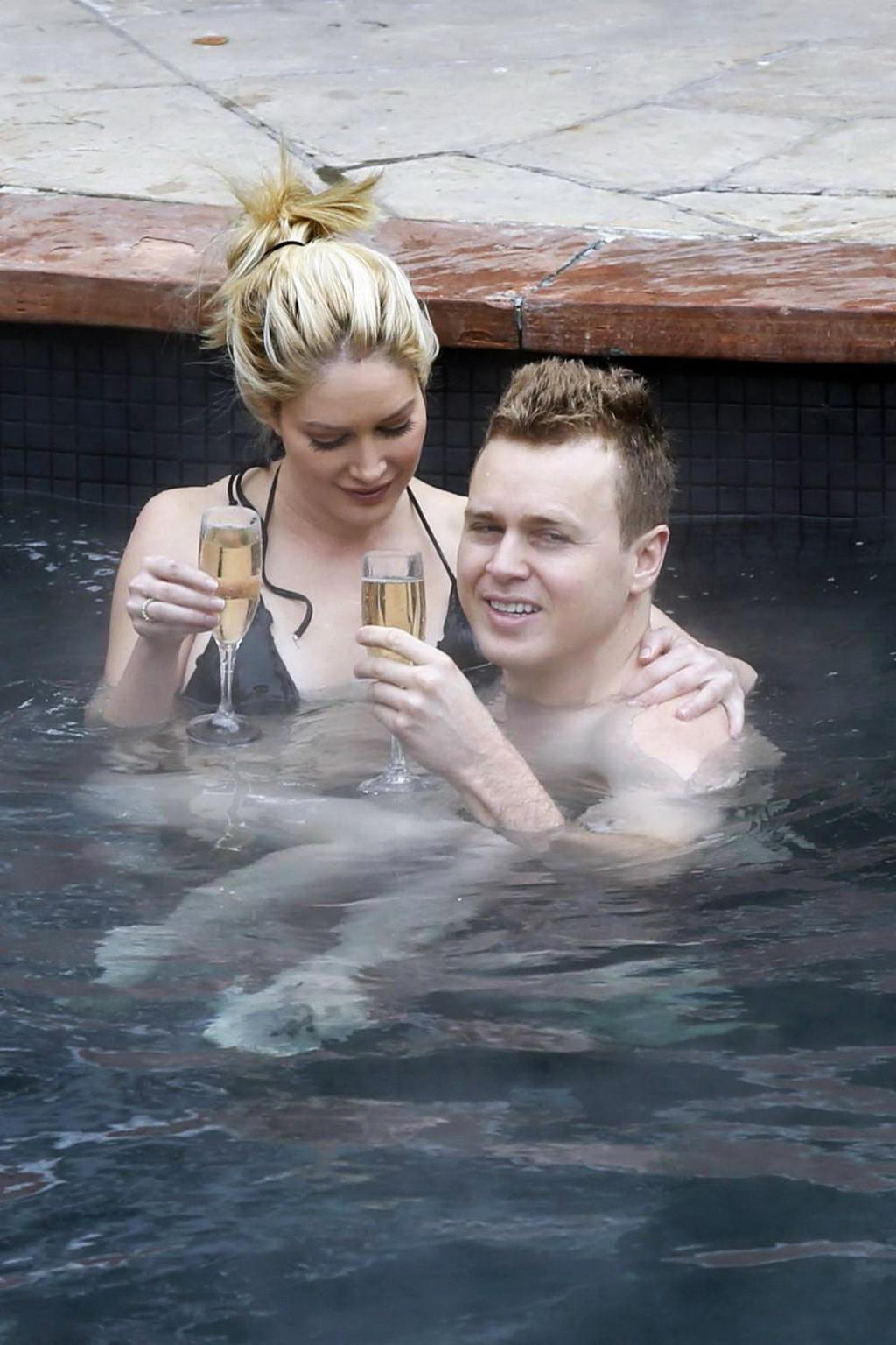 16P Heidi Montag busty in tiny black bikini in a hot spa during the vacation in Aspe